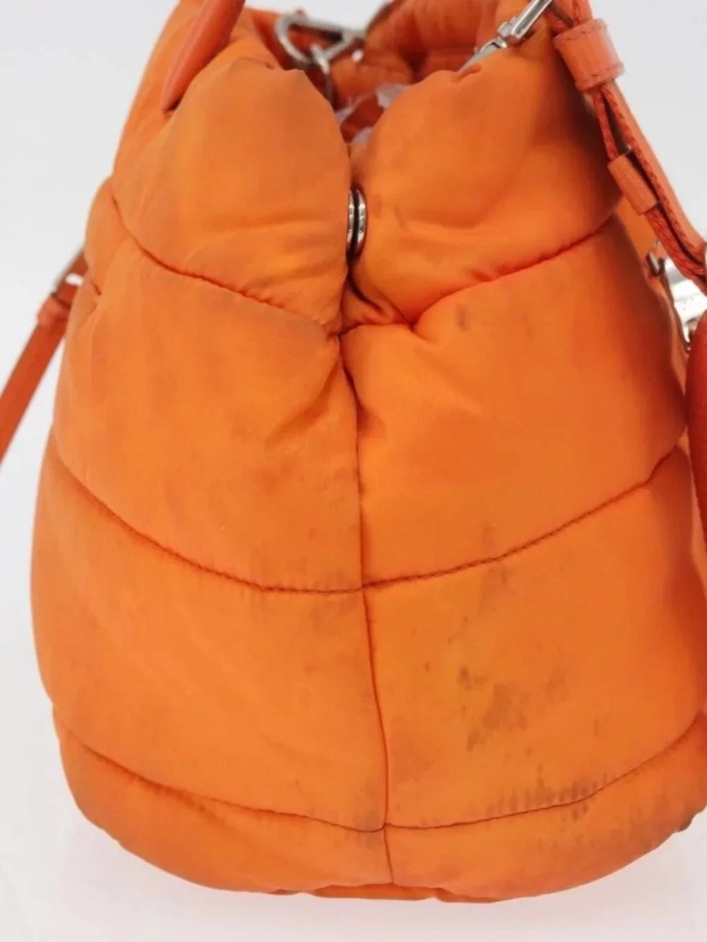 Prada brand	prada color	orange